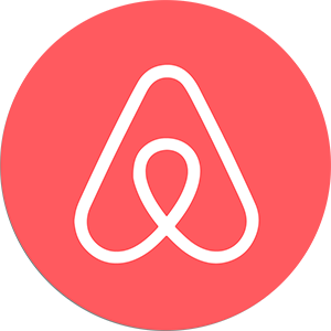 Das Bild zeigt das Airbnb-Logo, das eine stilisierte „A“-Form mit einer durchgehenden weißen Linie auf einem roten, kreisförmigen Hintergrund aufweist. Das Design ist schlicht und modern, spiegelt die Markenidentität des Unternehmens wider und ist eine ideale Empfehlung für die Präsentation minimalistischer Eleganz.